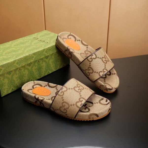 Gucci Maxi GG Canvas Slides